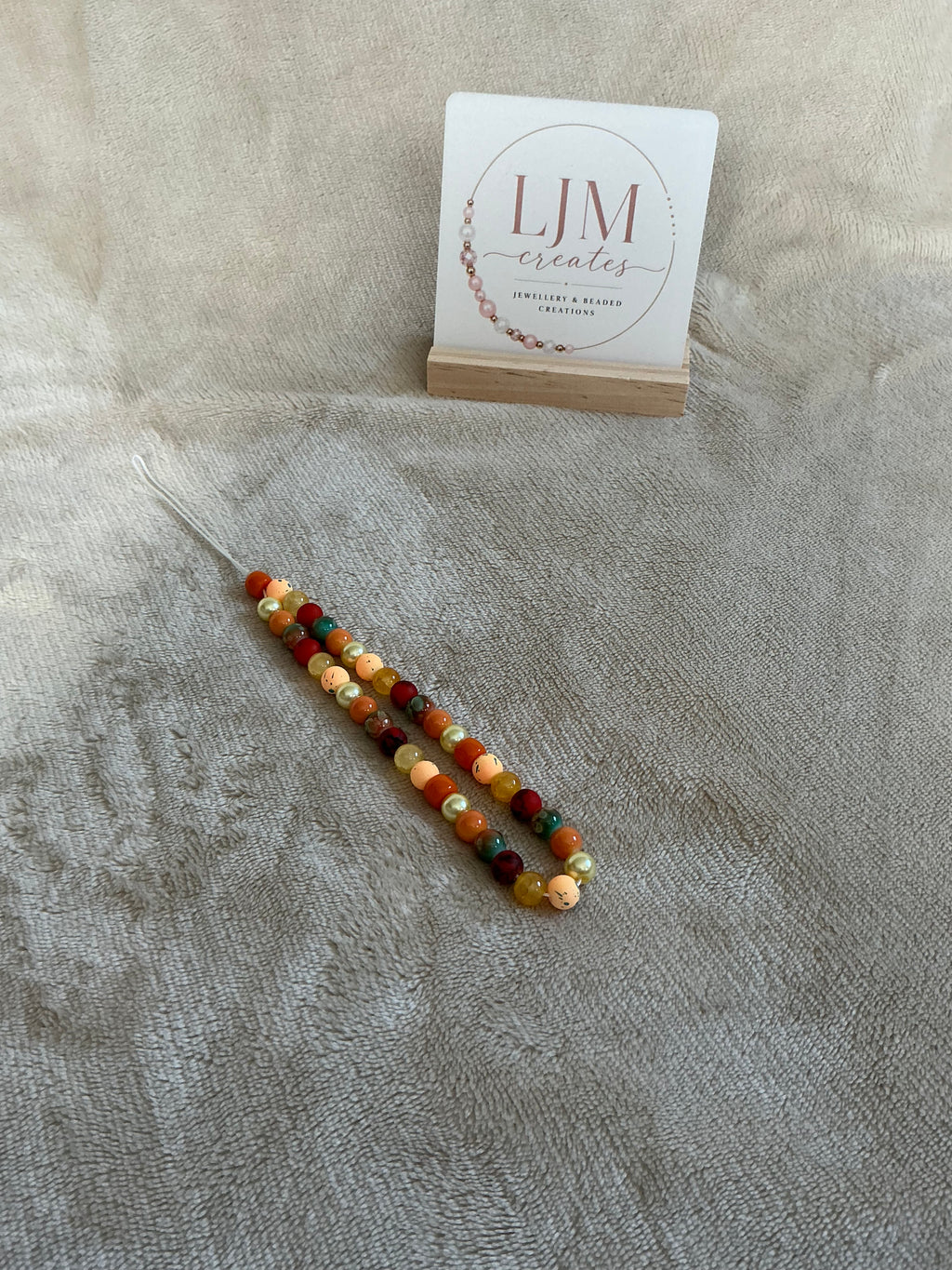 Warm Autumn Earth‑Tone Beaded Phone Charm